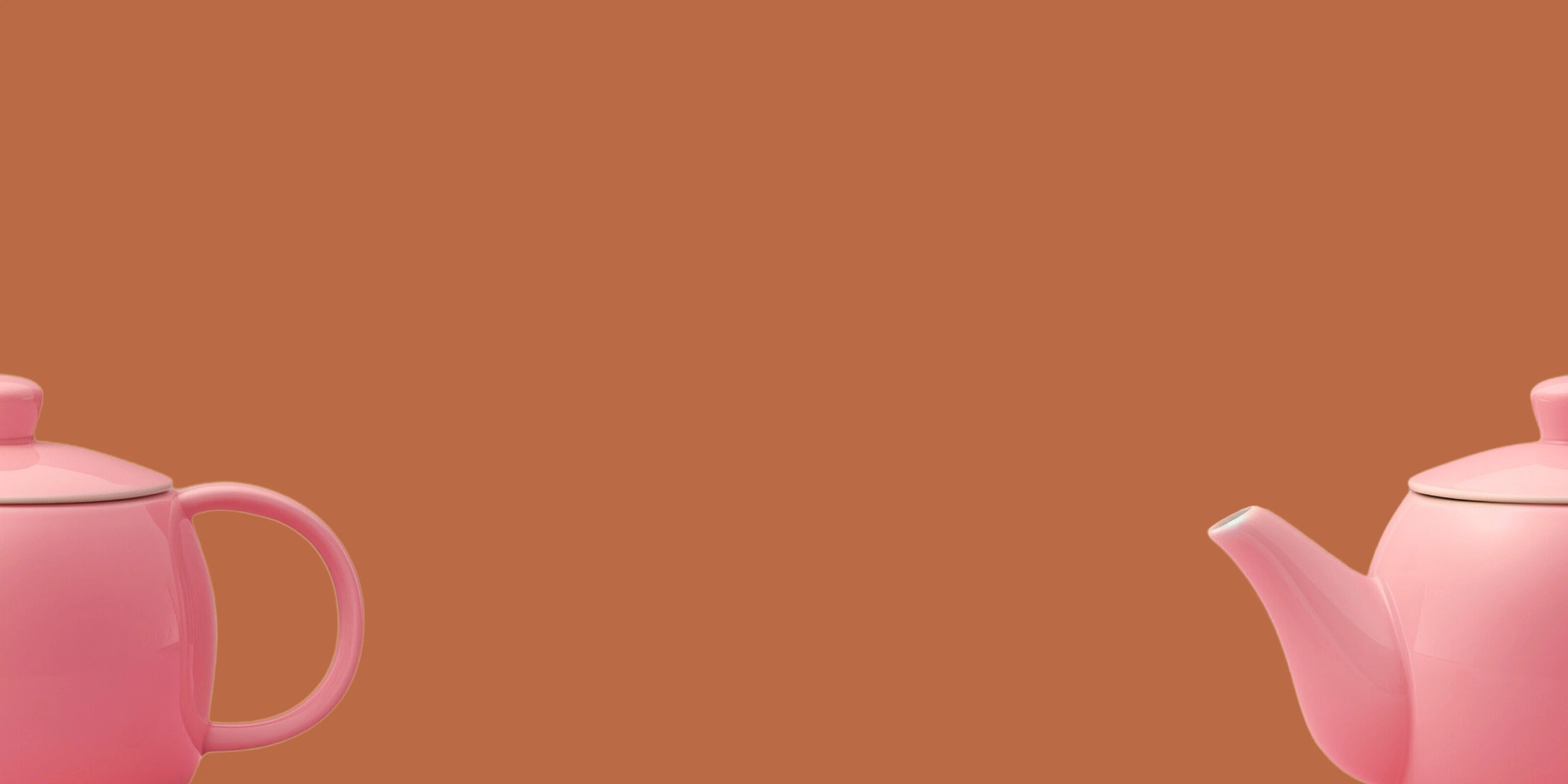 Image d'une théière à tisane moderne de couleur rose coupée en deux avec un fond orangé